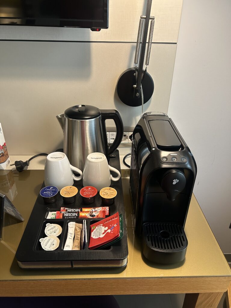 NYX Hotel Milan Review (2026): Is This the Best Hotel Near Milano Centrale? Coffee machine and amenities at NYX Hotel Milan