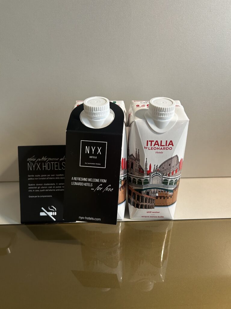 NYX Hotel Milan Review (2026): Is This the Best Hotel Near Milano Centrale? Complimentary bottled water at NYX Hotel Milan