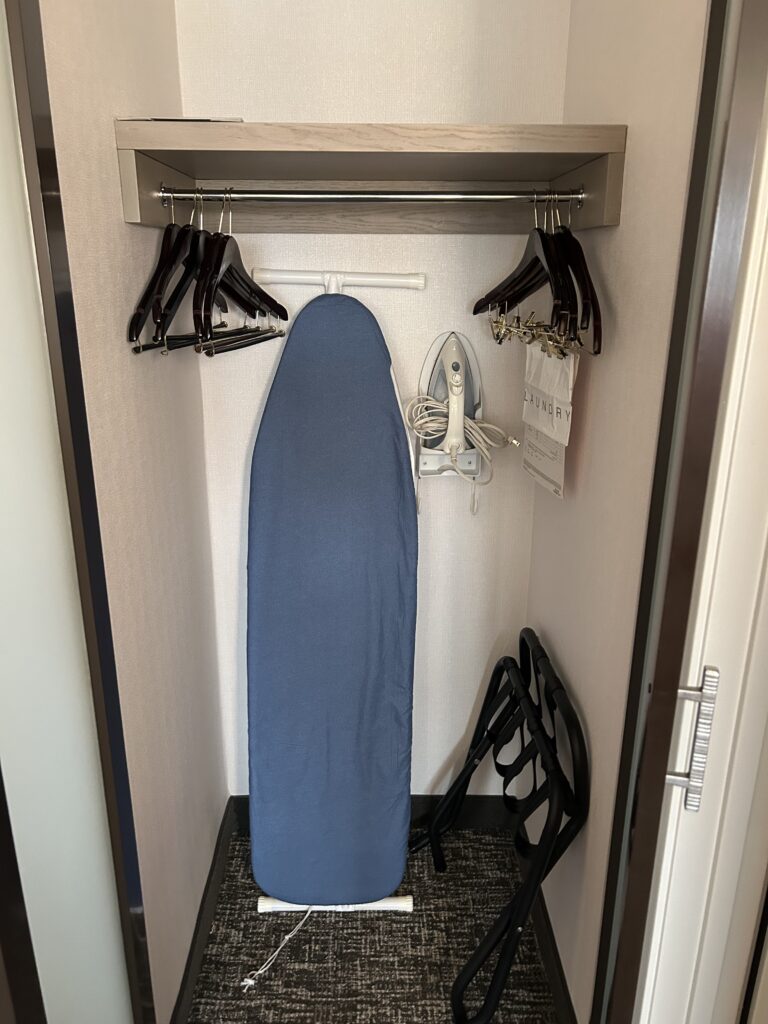 Modern guest room interior and bedding at Hilton LAX closet