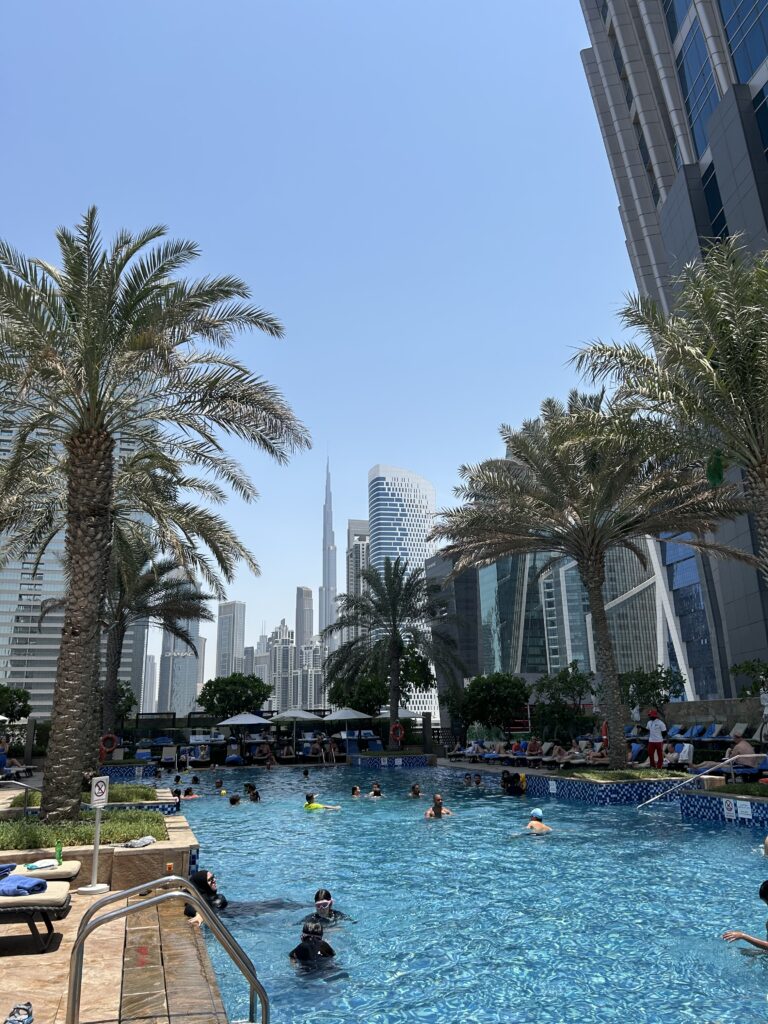 JW Marriott Marquis Dubai Review: The Hotel Emirates Gives for FREE! Hotel swimming pool with Burj Khalifa view at JW Marriott Marquis Dubai