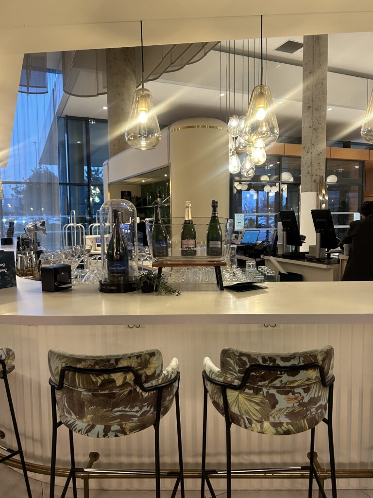Stylish and modern lobby area at Hyatt Place Paris Charles de Gaulle Airport hotel