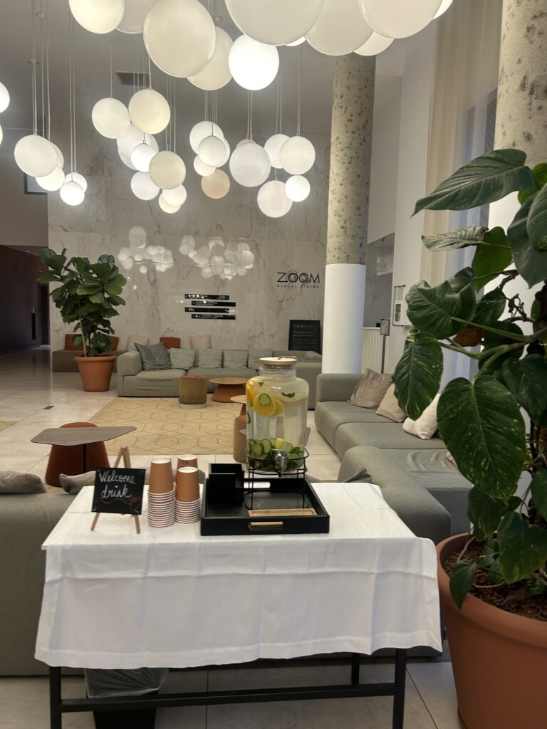 Complimentary cucumber lemon infused welcome drink in Hyatt Place Paris CDG lobby