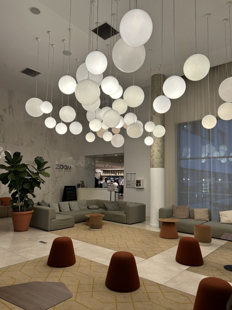 Stylish and modern lobby area at Hyatt Place Paris Charles de Gaulle Airport hotel 3