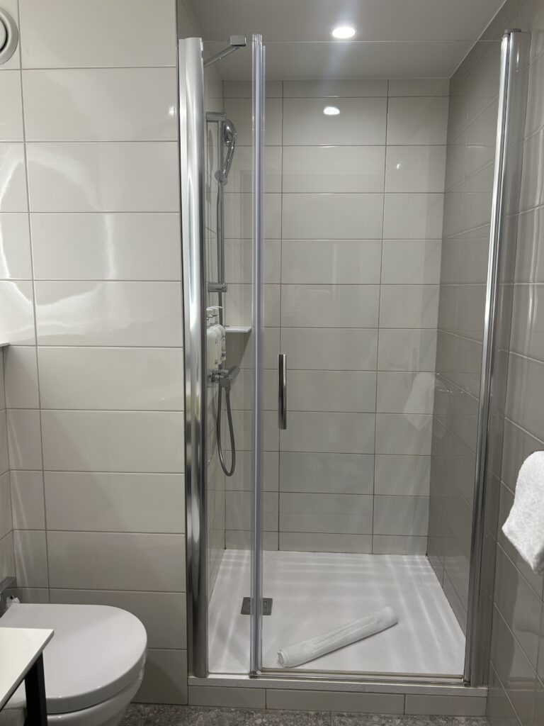 Clean and modern bathroom design at Hyatt Place Paris Charles de Gaulle Airport 2