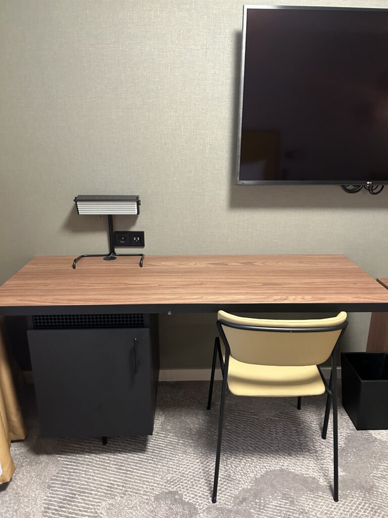 Dedicated work desk and laptop space at Hyatt Place Paris Charles de Gaulle Airport hotel