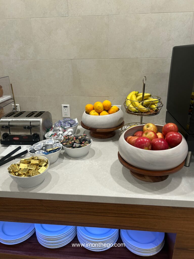 Honest Review of The Westin Los Angeles Airport: Rooms, Breakfast & Free Shuttle Assorted fruits, cheeses, and Chobani yogurt cups at hotel lounge