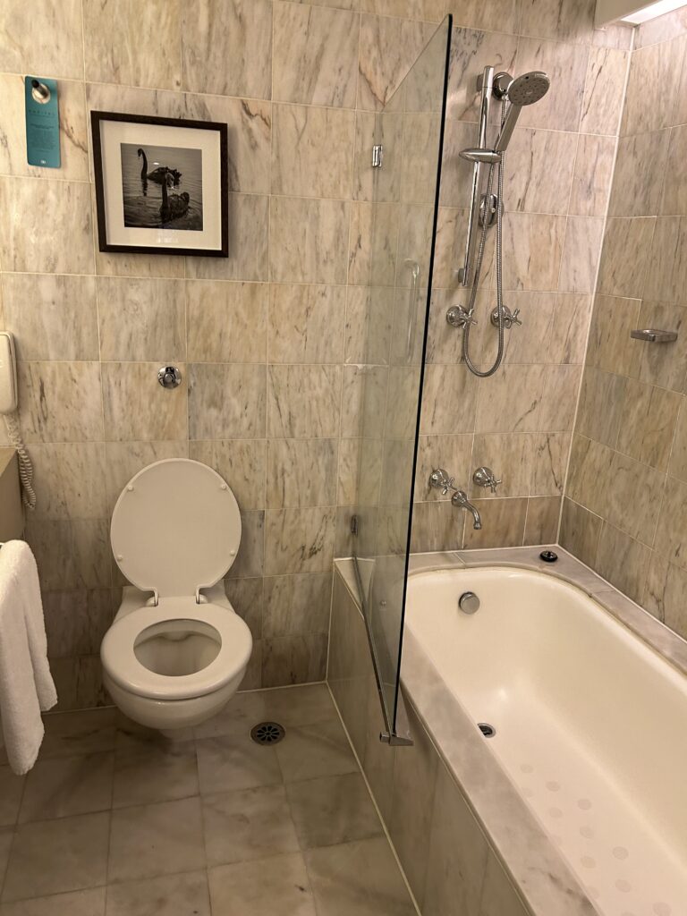 Sofitel Melbourne on Collins: The Ultimate Luxury Stay in Melbourne CBD Clean marble bathroom with deep soaking bathtub at Sofitel Melbourne